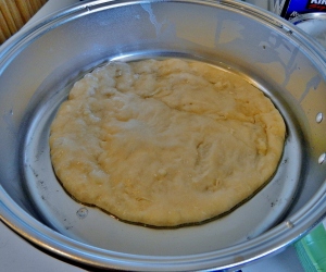 B - dough sits in skillet, absorbing oil, but not rising